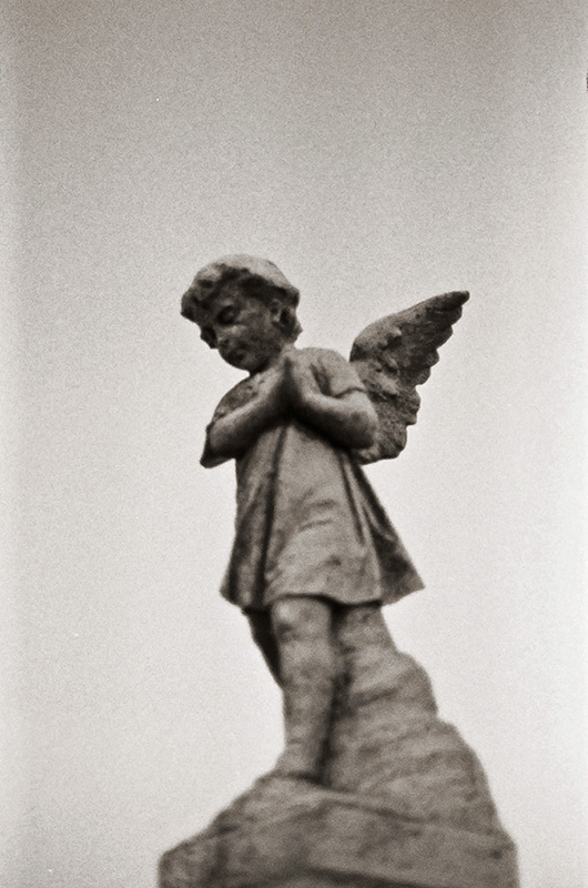 An angel watching over graveyard